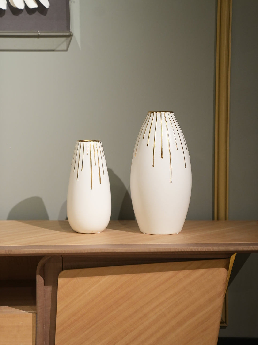 White and golden lined vase